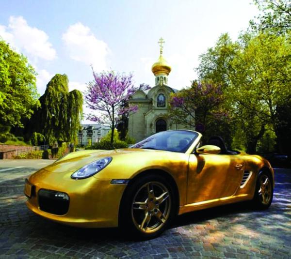 تصاویر ماشین هایی با روکش طلا ، چه کسانی سوار خودروهای طلایی می شوند؟